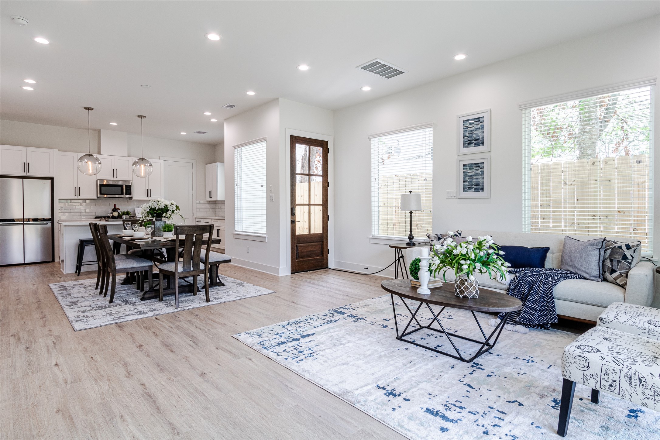 6814 Burkett Street, Unit B Houston, TX 77021 - Photo 5 of 30 a living room with furniture and wooden floor