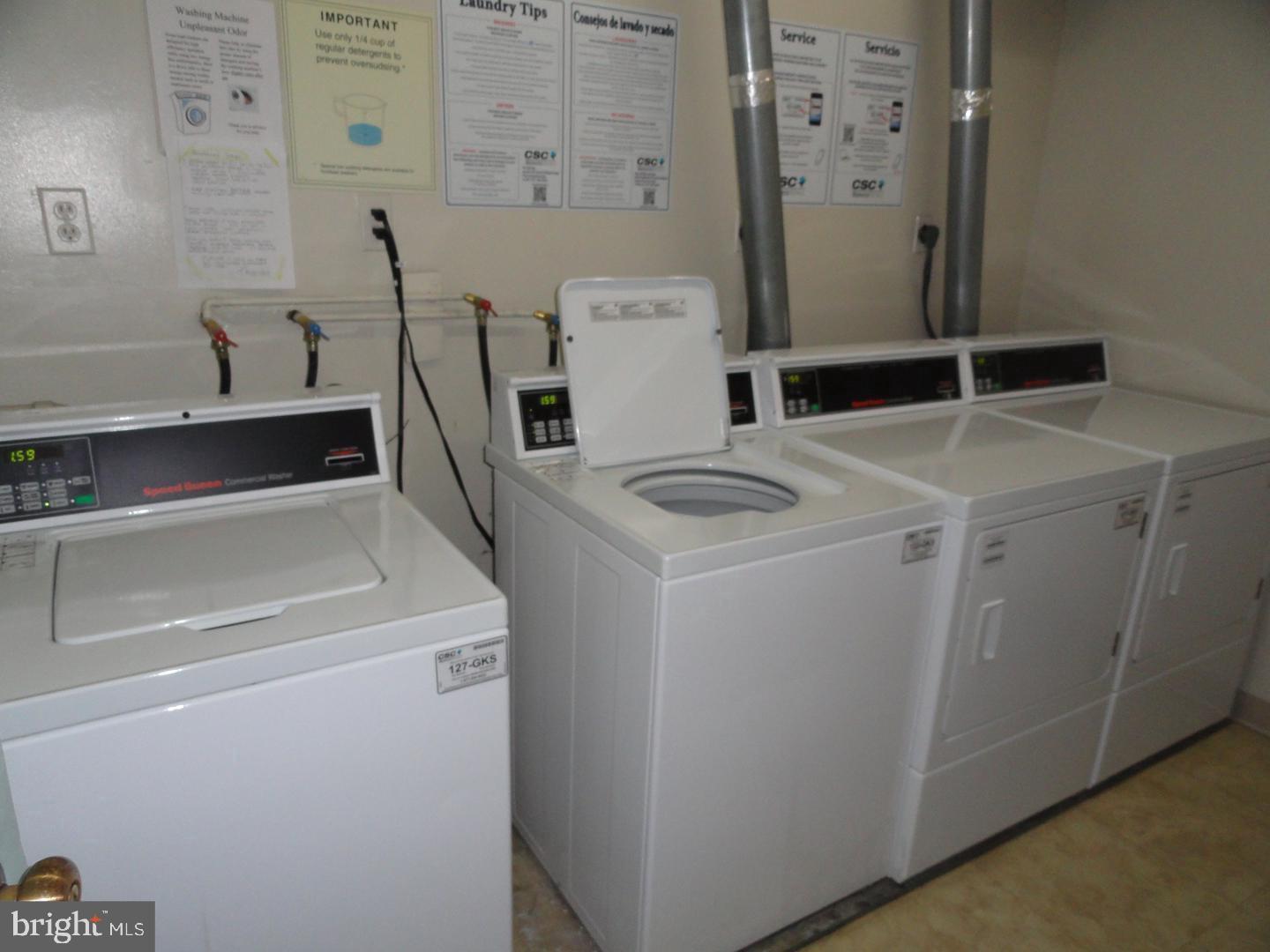 2059 Huntington Avenue, Unit 802 Alexandria, VA 22303 - Photo 13 of 18 a utility room with dryer and washer