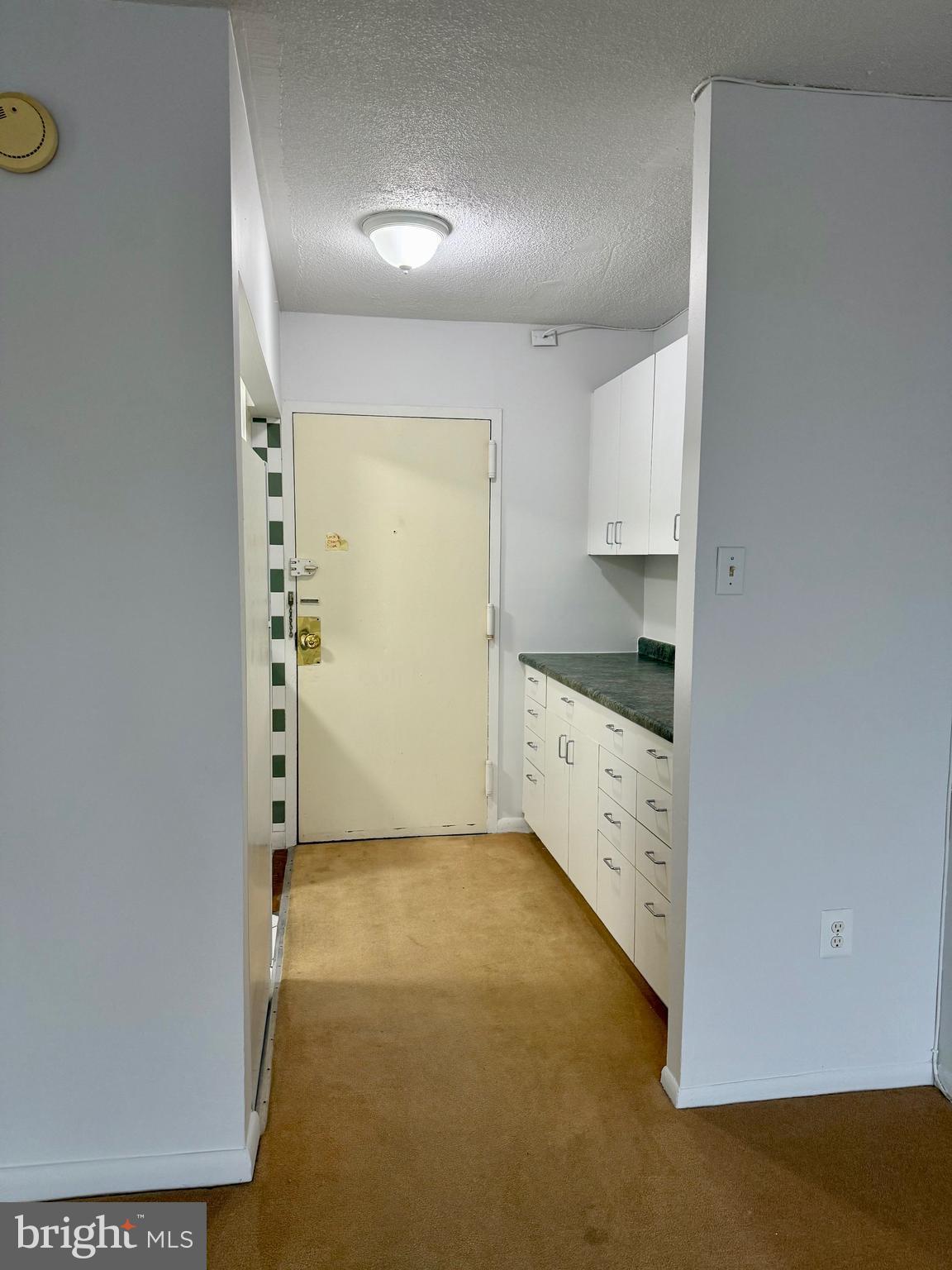2059 Huntington Avenue, Unit 802 Alexandria, VA 22303 - Photo 2 of 18 a view of cabinets and wooden floor