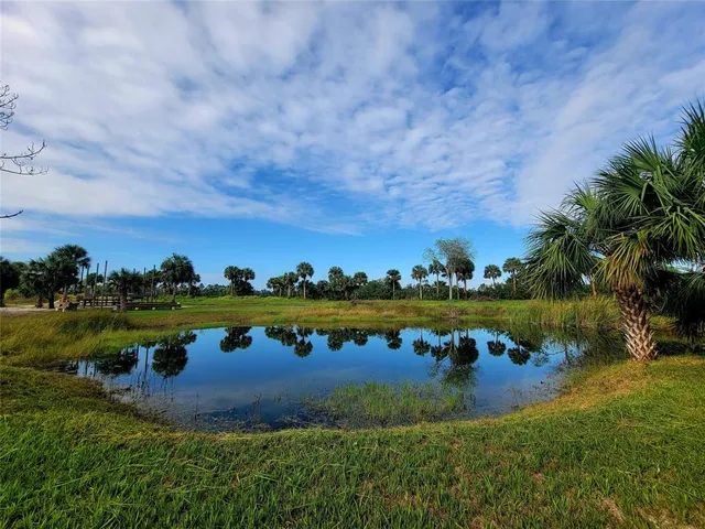 a view of a lake with outdoor space and outdoor space