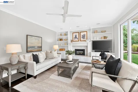 a kitchen with stainless steel appliances granite countertop a lot of counter space and wooden floors