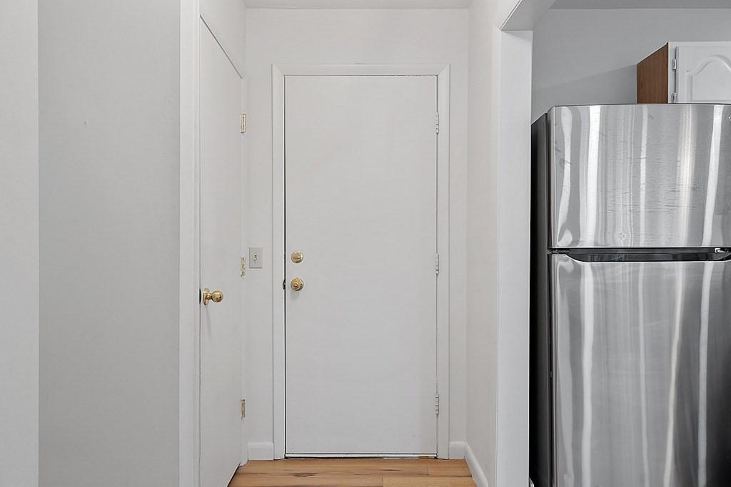 6 Leonard Road, Unit 6 Boxborough, MA 01719 - Photo 16 of 28 a view of a kitchen with a refrigerator