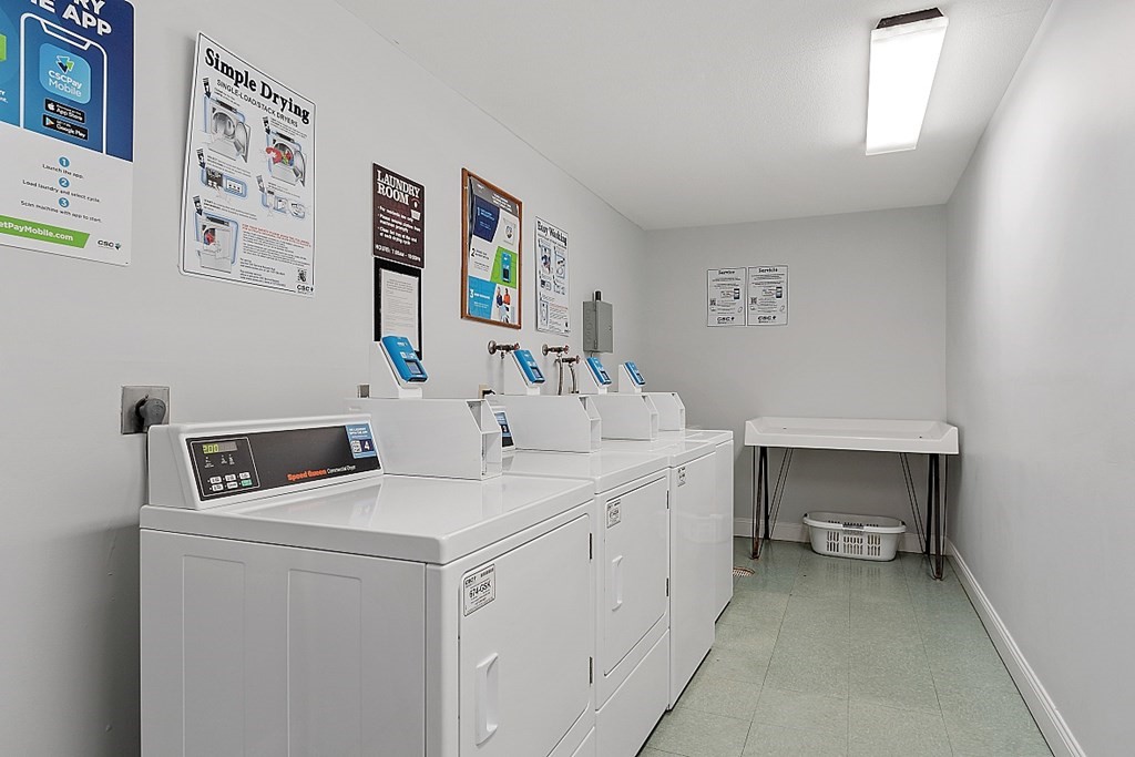 6 Leonard Road, Unit 6 Boxborough, MA 01719 - Photo 20 of 28 a utility room with dryer and washer