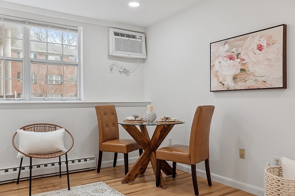 6 Leonard Road, Unit 6 Boxborough, MA 01719 - Photo 3 of 28 a view of a dining room with furniture and window