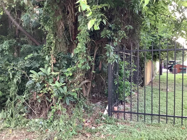 a view of a street with that has a parked car
