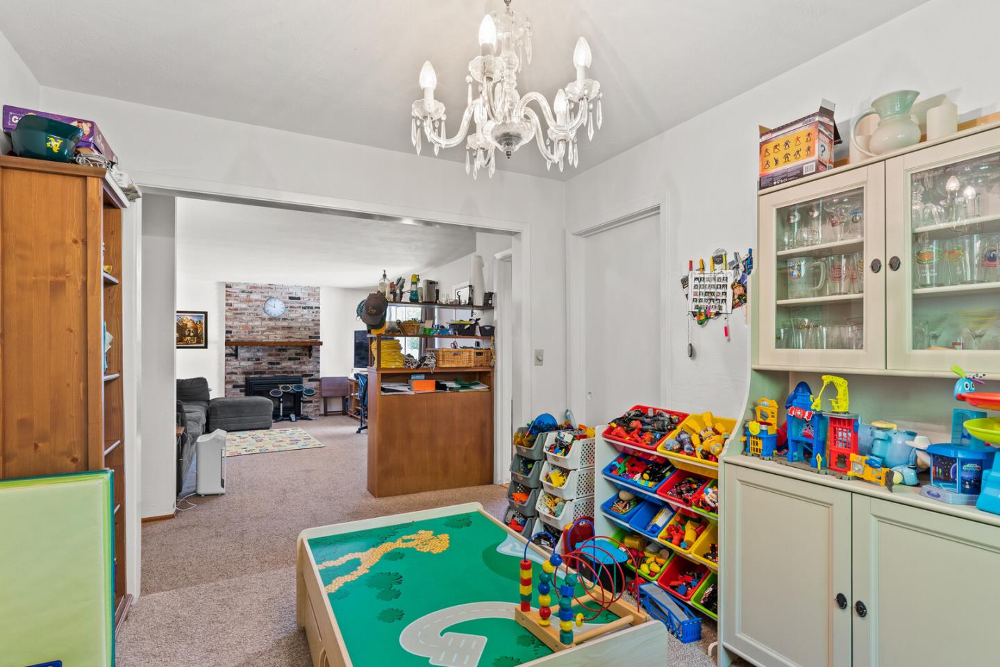 716 Prospect Row San Mateo, CA 94401 - Photo 22 of 39 a play room with furniture and a baby crib