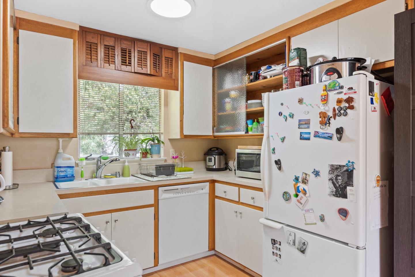 716 Prospect Row San Mateo, CA 94401 - Photo 25 of 39 a kitchen with stainless steel appliances a refrigerator and a stove