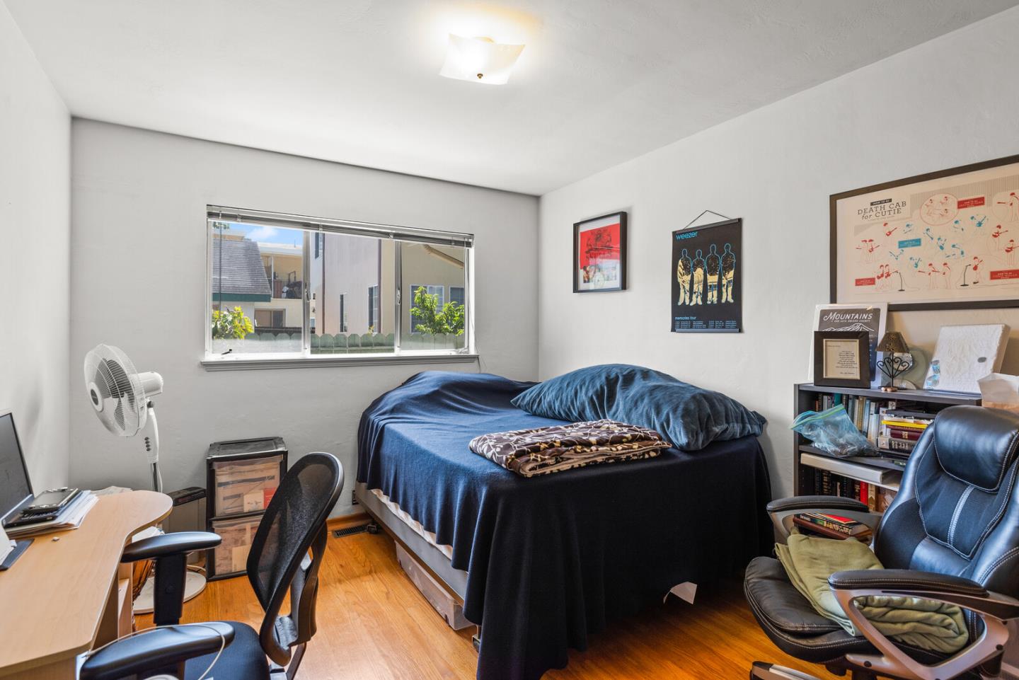 716 Prospect Row San Mateo, CA 94401 - Photo 29 of 39 a bedroom with a bed and a couch