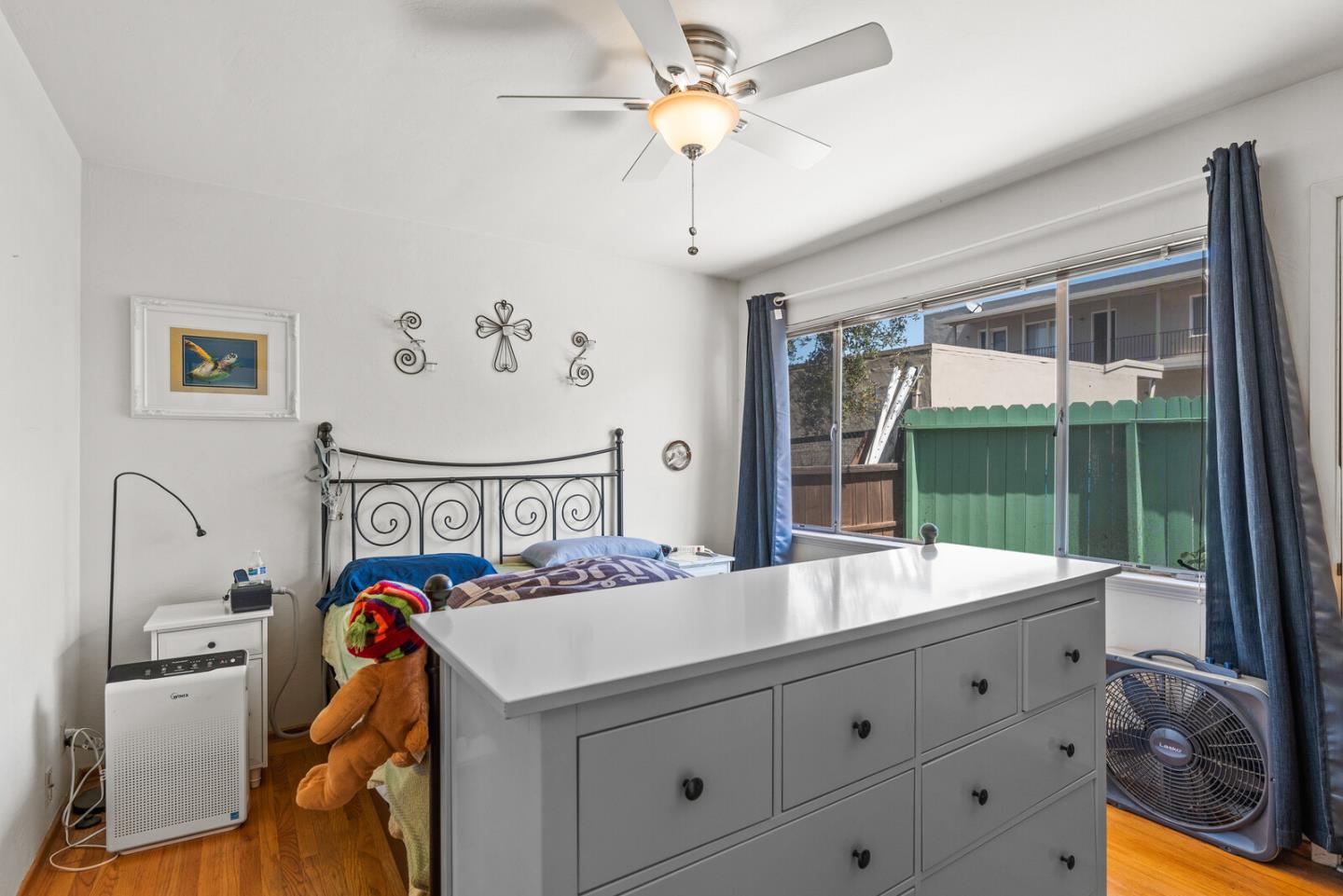 716 Prospect Row San Mateo, CA 94401 - Photo 32 of 39 a room with gym equipment and a large window