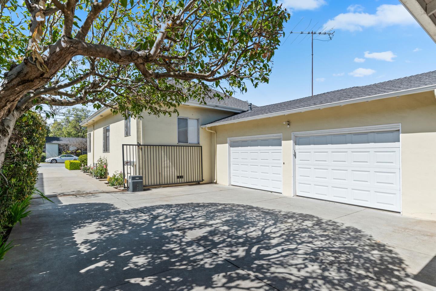 716 Prospect Row San Mateo, CA 94401 - Photo 38 of 39 a view of a house with a tree