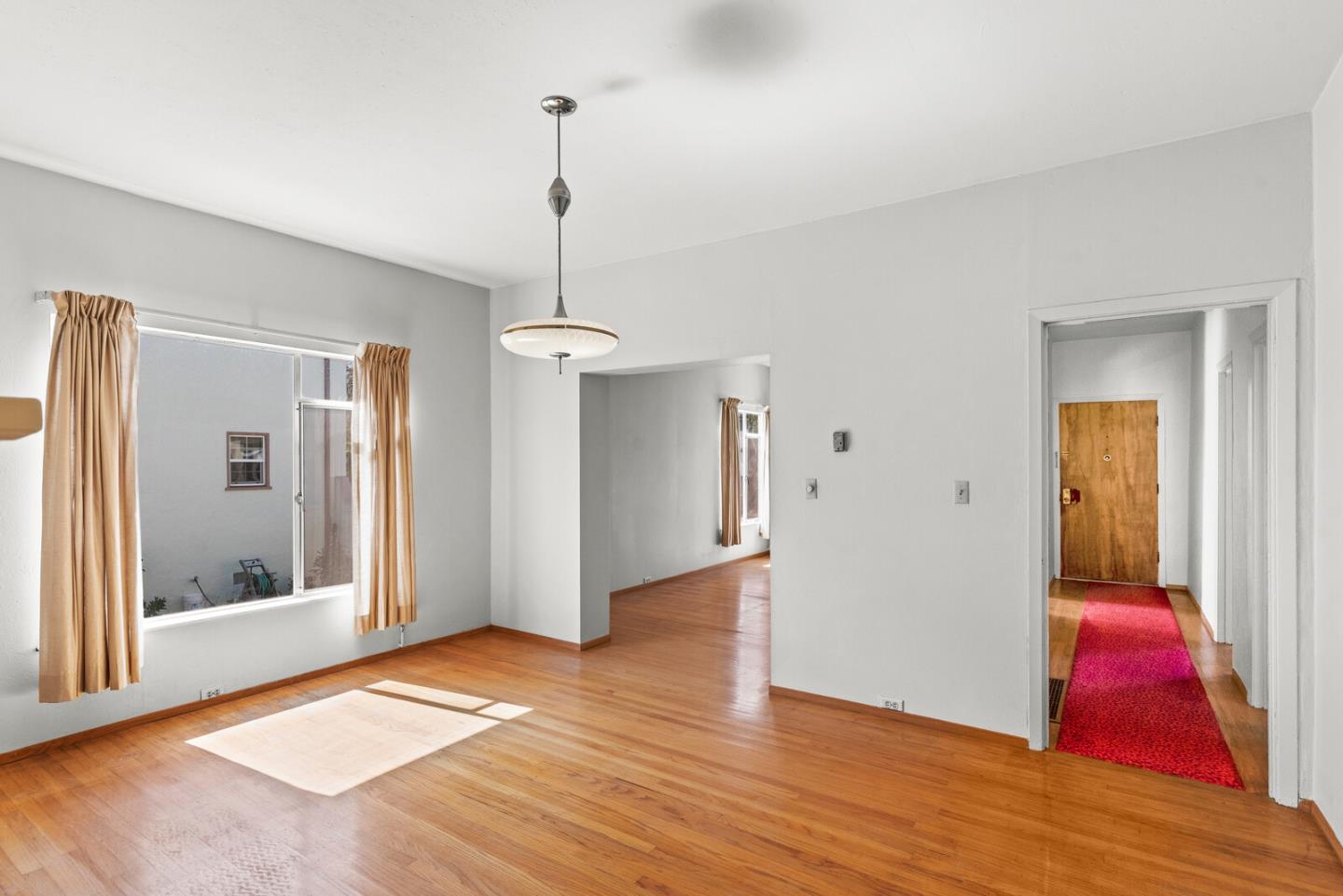 716 Prospect Row San Mateo, CA 94401 - Photo 9 of 39 a view of empty room with wooden floor