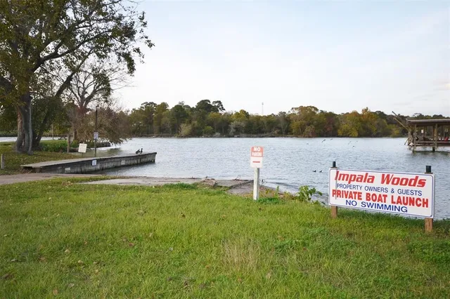 a view of a lake with sitting area