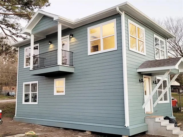 a front view of a house with a balcony