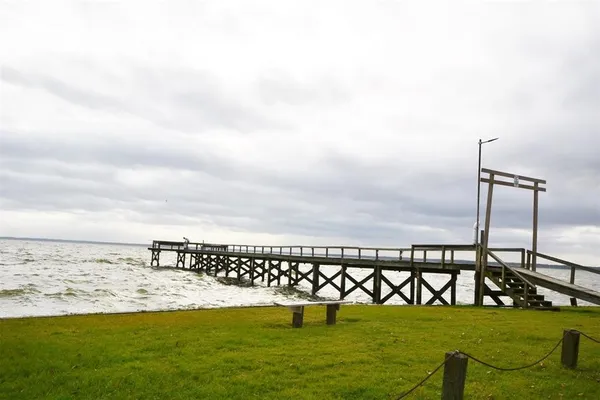 a view of swimming pool with an ocean view