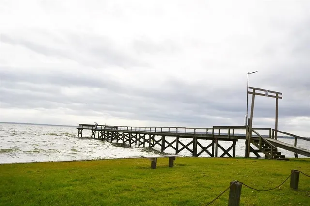 a view of swimming pool with an ocean view