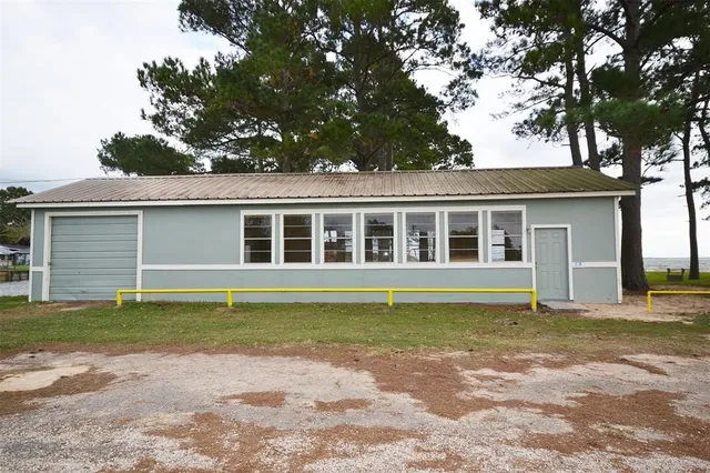 a view of a house with a swimming pool
