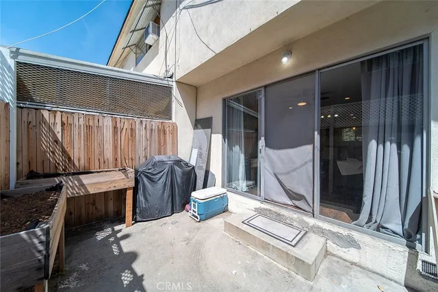 a view of a porch with furniture