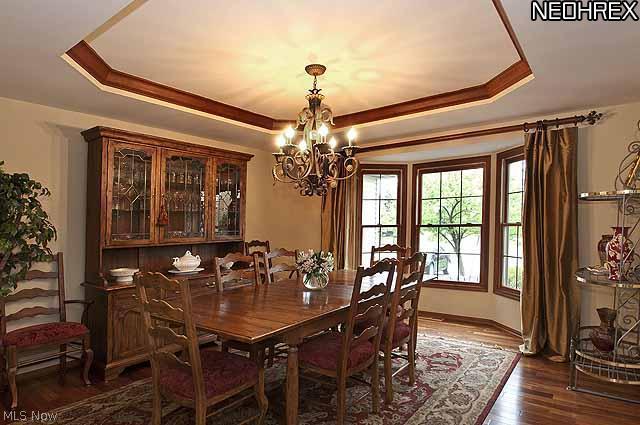 357 Longspur Road Highland Heights, OH 44143 - Photo 6 of 22 Large dining room features a wood trimmed trey ceiling and large walk-in bay window