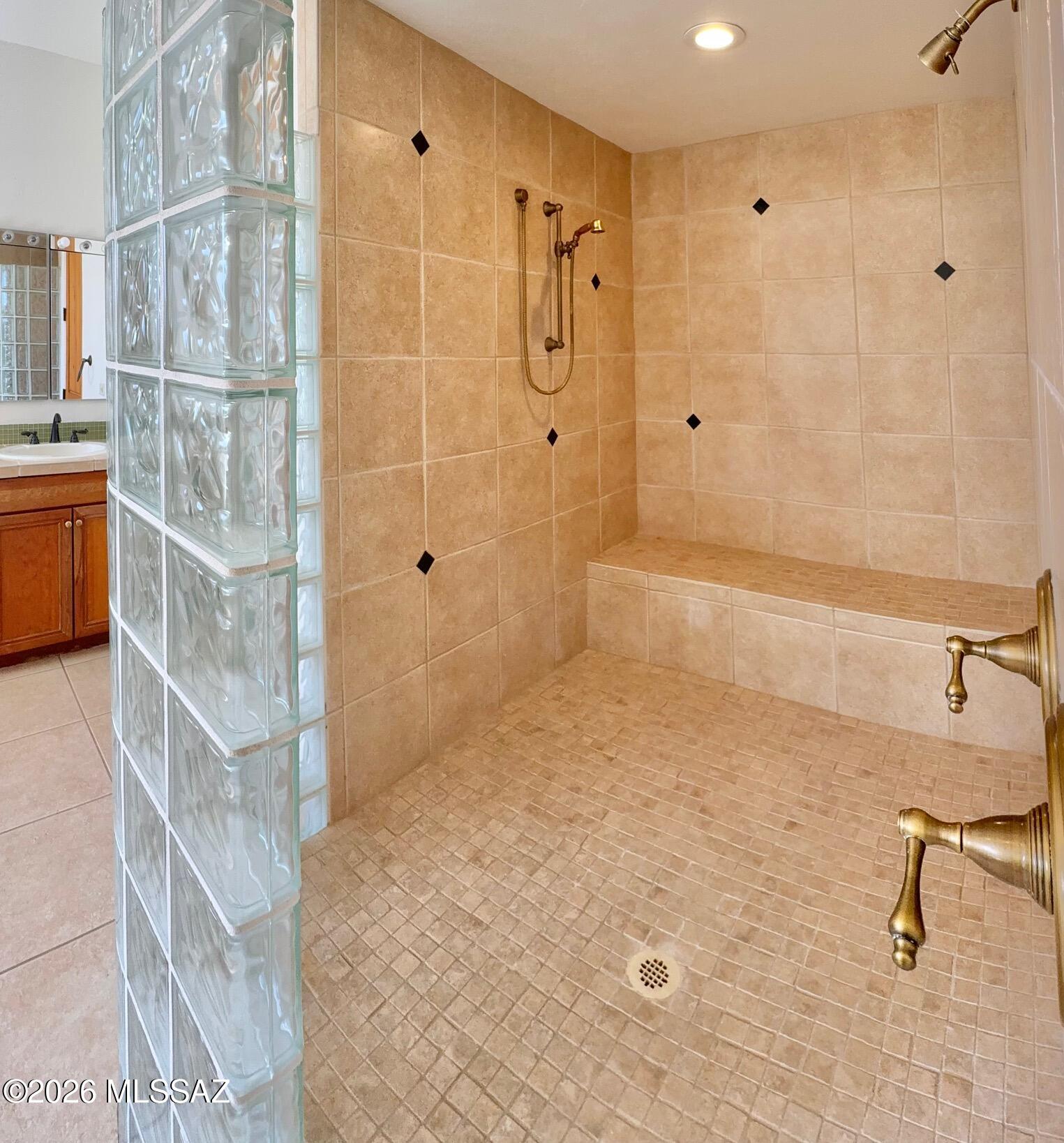 16781 Sycamore Ridge Trail Vail, AZ 85641 - Photo 20 of 50 Tiled shower with multiple shower heads & spa seat