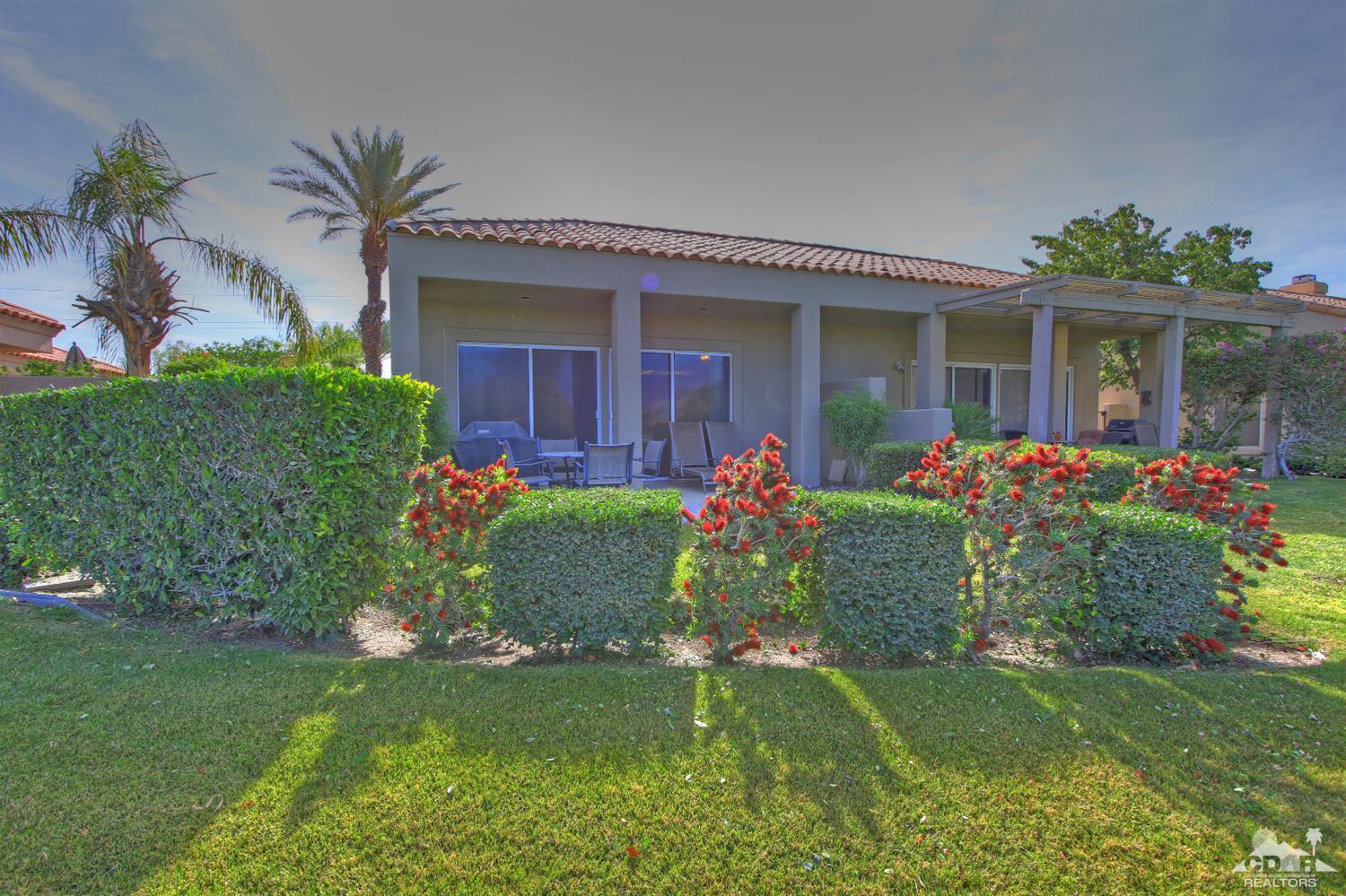15 Augusta Drive Rancho Mirage, CA 92270 - Photo 26 of 35 front view of a house with a yard