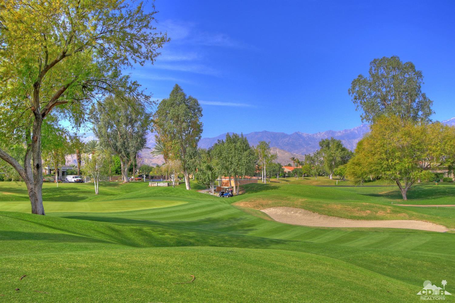 15 Augusta Drive Rancho Mirage, CA 92270 - Photo 29 of 35 a view of a golf course with a play ground