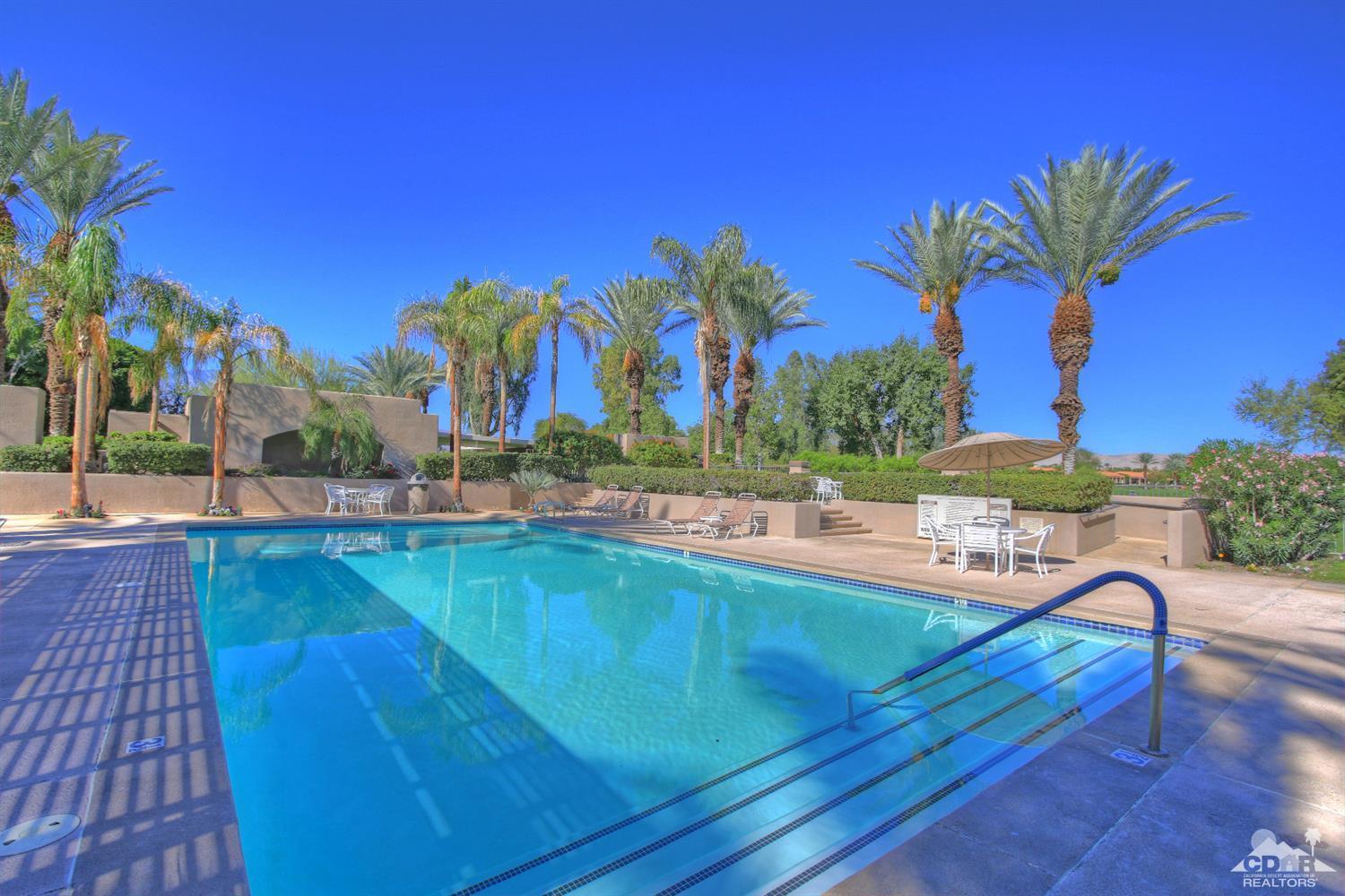 15 Augusta Drive Rancho Mirage, CA 92270 - Photo 31 of 35 a view of a swimming pool with outdoor seating