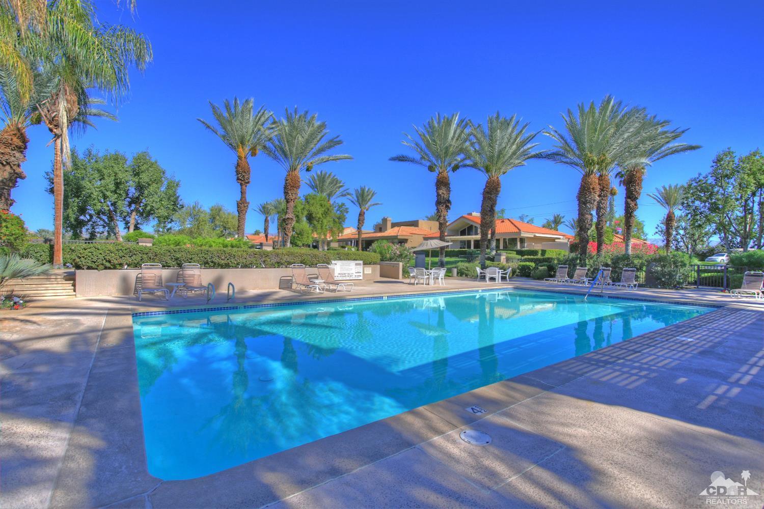 15 Augusta Drive Rancho Mirage, CA 92270 - Photo 32 of 35 a view of outdoor space with trees and swimming pool