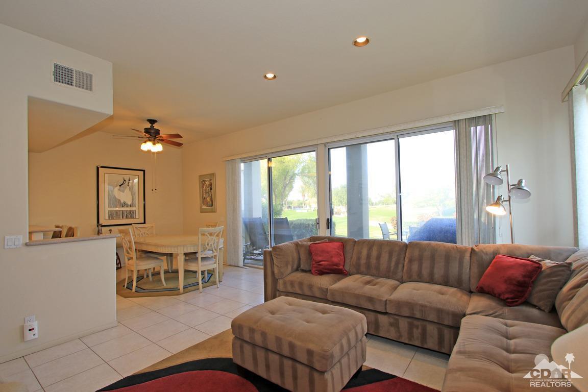 15 Augusta Drive Rancho Mirage, CA 92270 - Photo 7 of 35 a living room with furniture and a large window