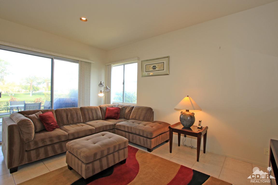 15 Augusta Drive Rancho Mirage, CA 92270 - Photo 8 of 35 a living room with furniture and a large window