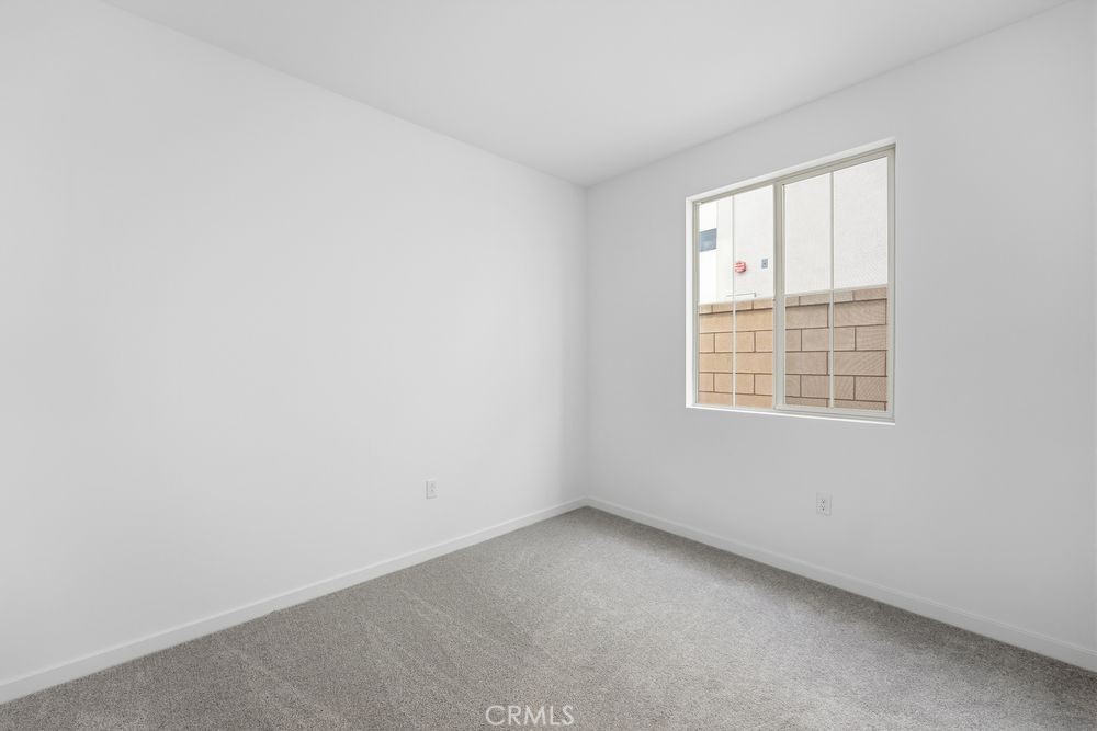 9575 Silverstein Drive Riverside, CA 92508 - Photo 15 of 22 an empty room with a window