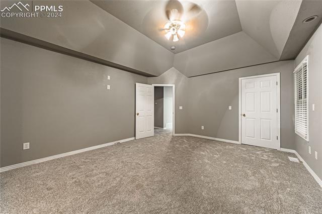 1027 County Road LL Fowler, CO 81039 - Photo 21 of 37 Unfurnished bedroom with ceiling fan and carpet