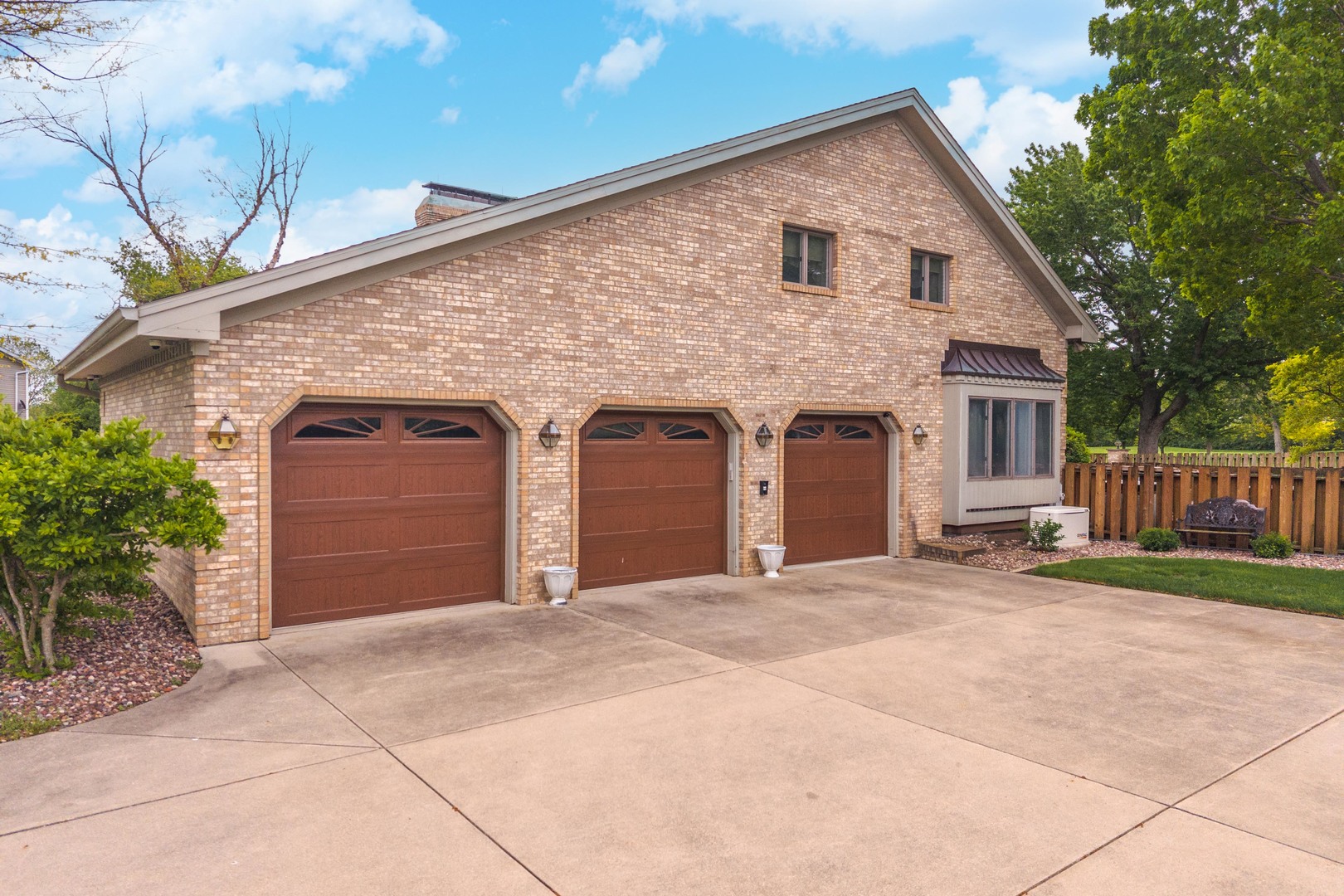1810 Cardinal Court Pontiac, IL 61764 - Photo 72 of 88 a front view of a house with a garage