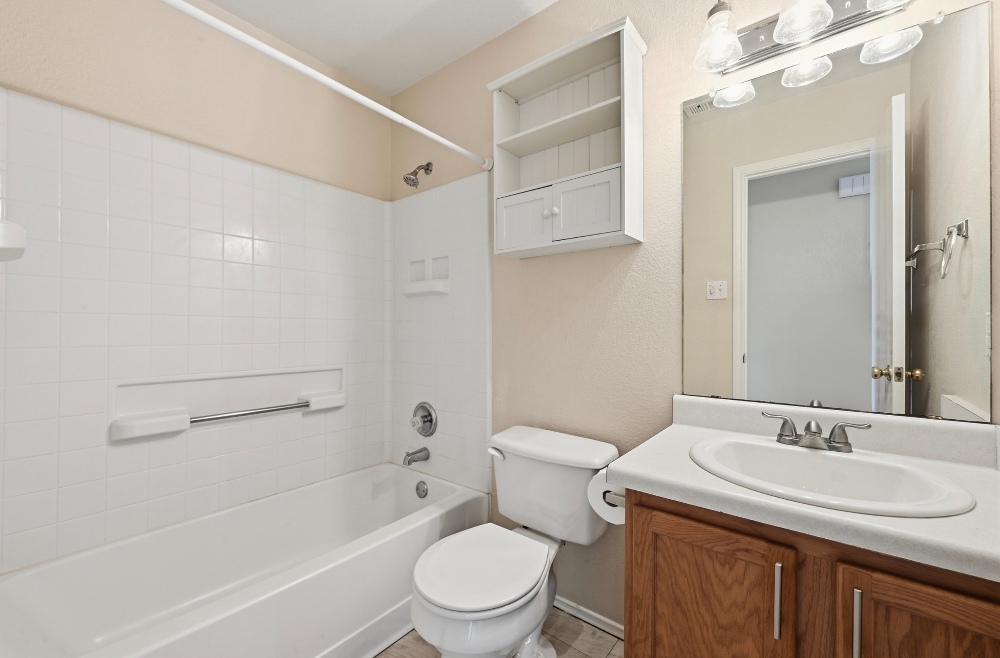 112 Mason Reed Cove Kyle, TX 78640 - Photo 20 of 26 a bathroom with a sink a toilet and shower