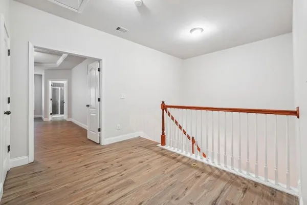 a view of entryway with wooden floor