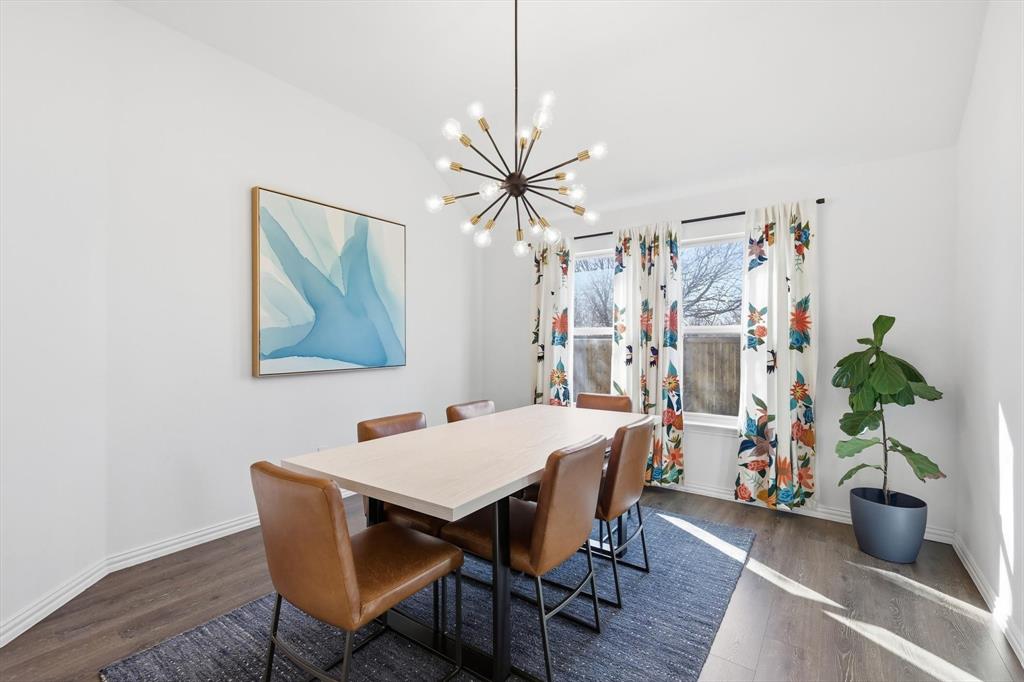 7508 Rhyner Way Fort Worth, TX 76137 - Photo 11 of 23 Formal dining room with decorative lighting.