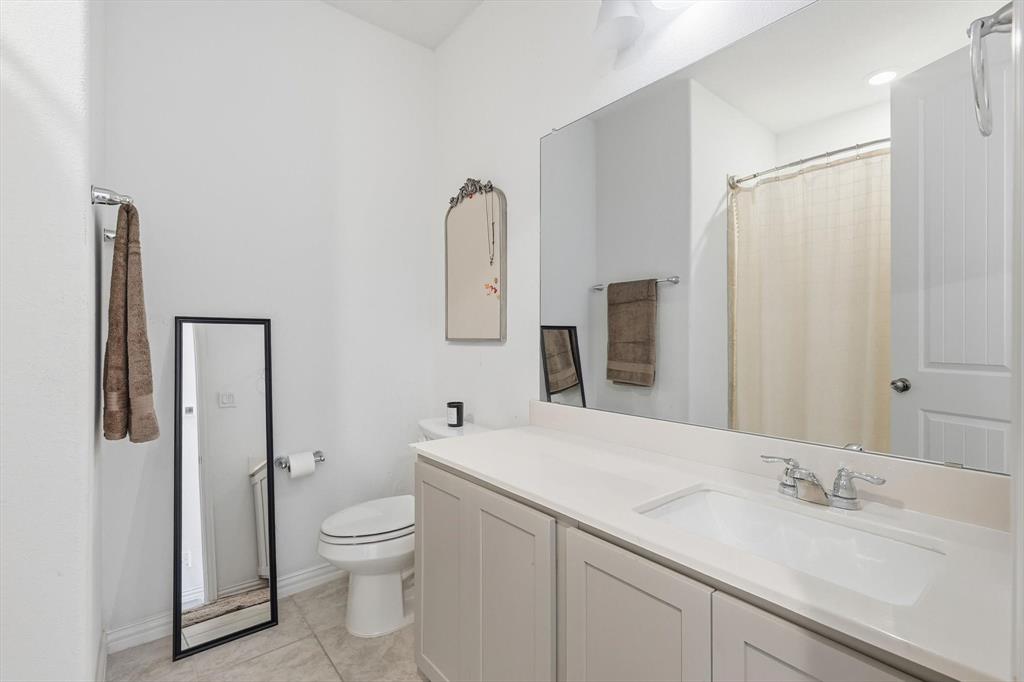 7508 Rhyner Way Fort Worth, TX 76137 - Photo 17 of 23 Guest bathroom.