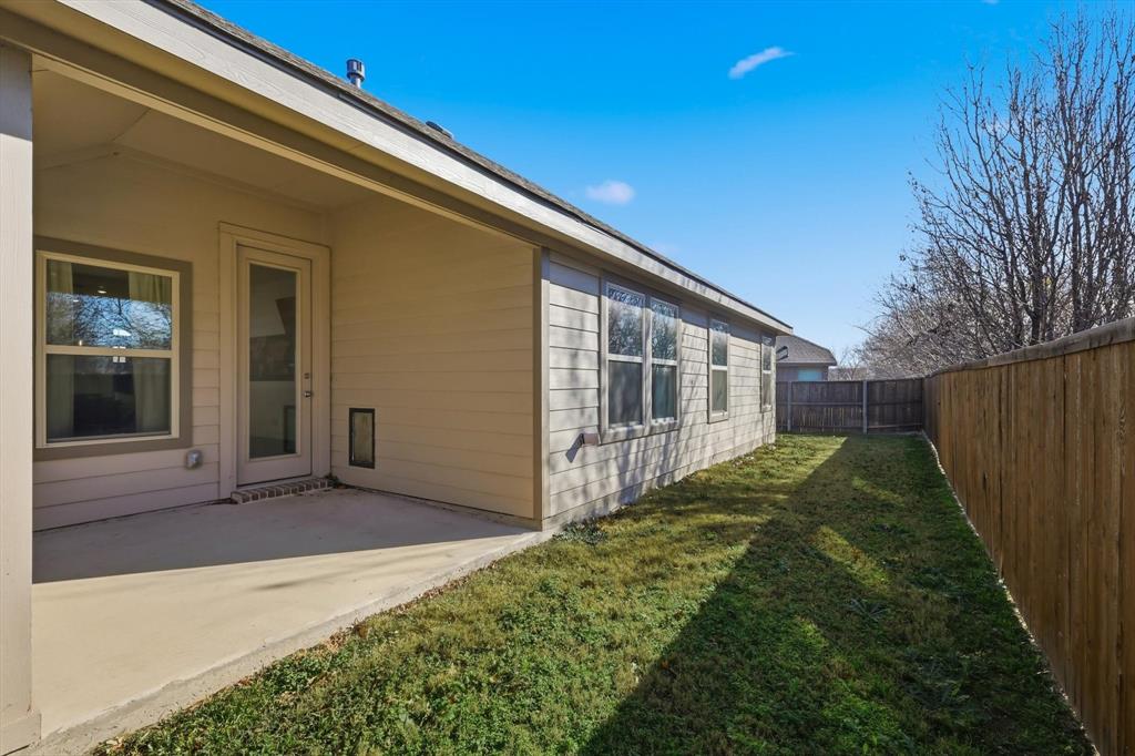7508 Rhyner Way Fort Worth, TX 76137 - Photo 20 of 23 Covered patio. There's a pet door!