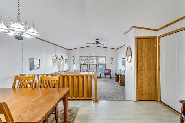 a view of a living room and dining room