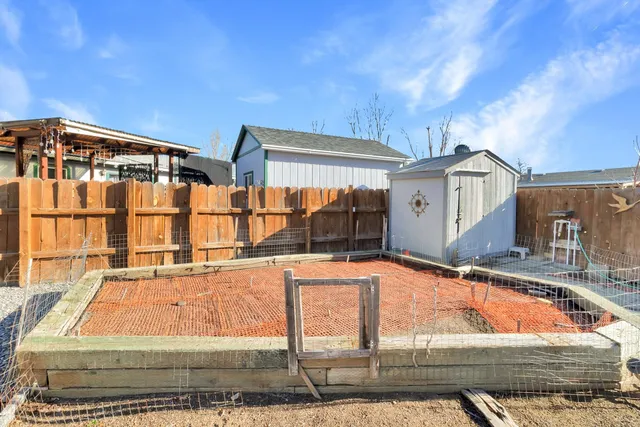 a view of swimming pool with outdoor seating