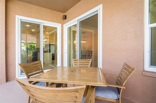 a view of a swimming pool with a porch