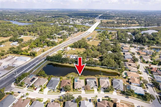 a view of city with ocean