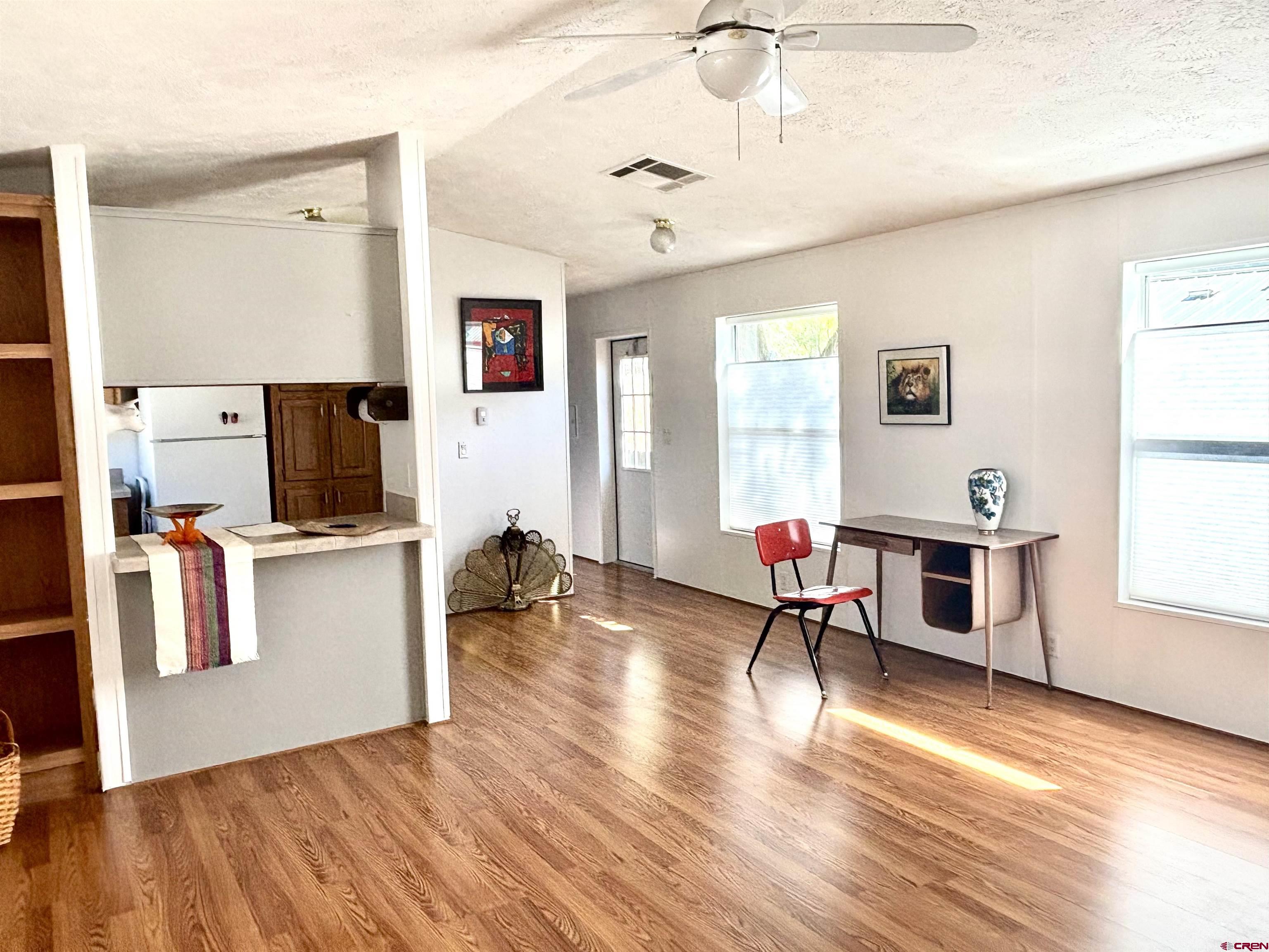 288 Animas View Drive, Unit 9 Durango, CO 81301 - Photo 8 of 16 a living room with furniture and a flat screen tv