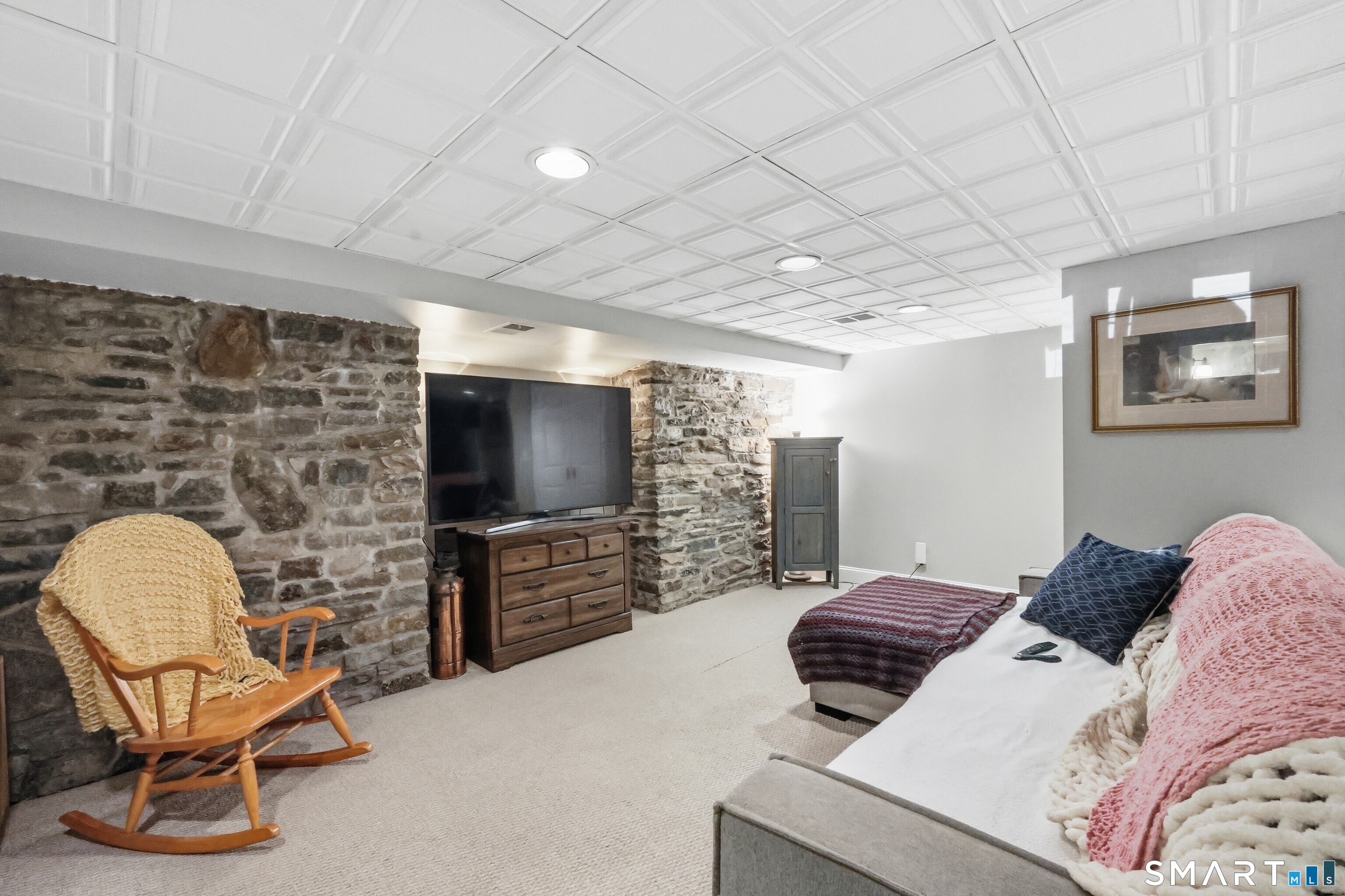 174 Canton Road Granby, CT 06035 - Photo 19 of 35 a bedroom with a bed and a chair
