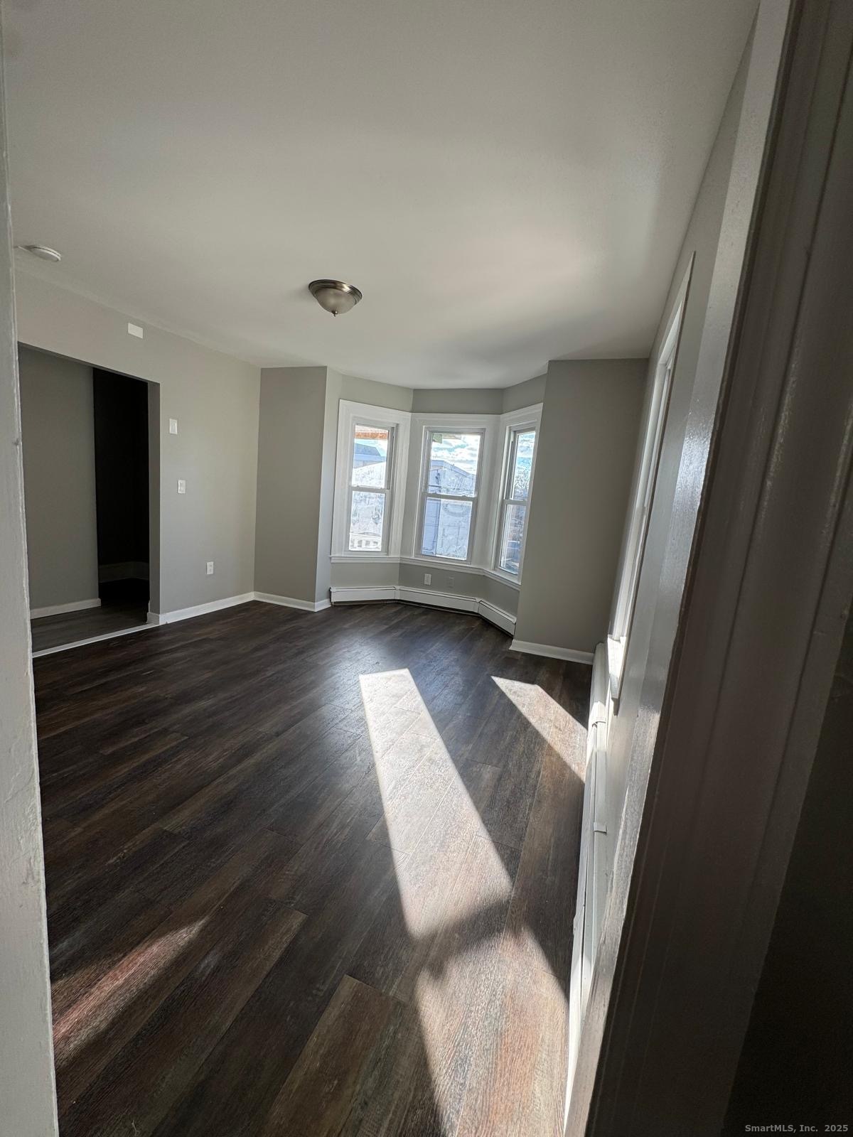 422 Lafayette Street, Unit 1R Bridgeport, CT 06604 - Photo 4 of 15 a view of entryway with window and wooden floor