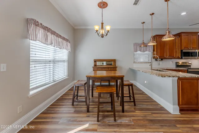 a bathroom with a tub shower and sink