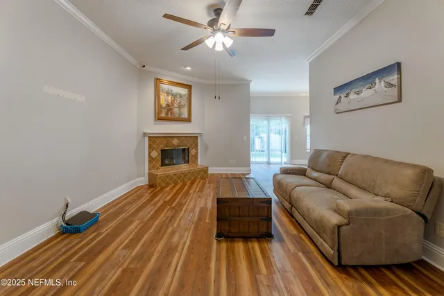 a white toilet sitting next to a bath tub