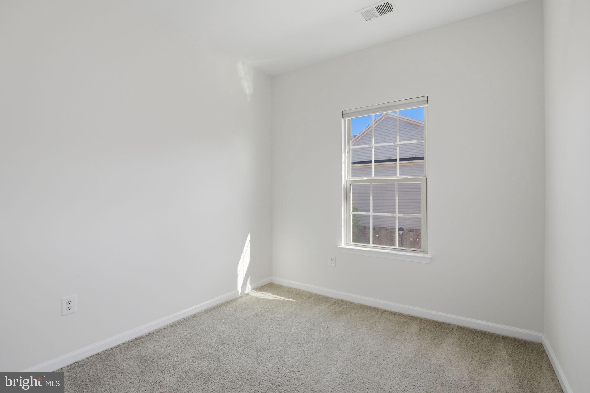 2784 Fredericksburg Road Hanover, MD 21076 - Photo 50 of 60 an empty room with a window