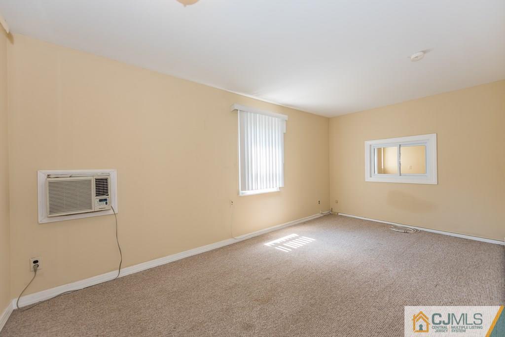 1518 Englishtown Road Old Bridge, NJ 08857 - Photo 11 of 25 a view of an empty room with a window
