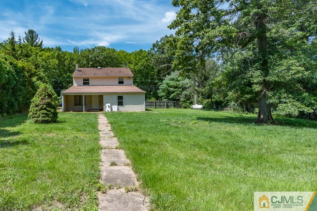 1518 Englishtown Road Old Bridge, NJ 08857 - Photo 24 of 25 a front view of a house with a yard