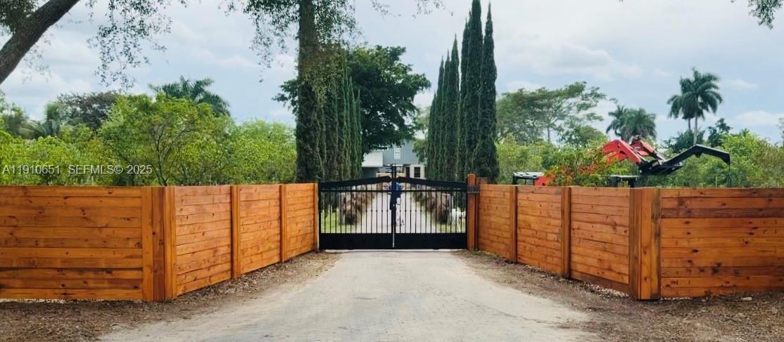a view of a fence in front of house